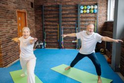pexels-yankrukov-6815698 older couple doing yoga